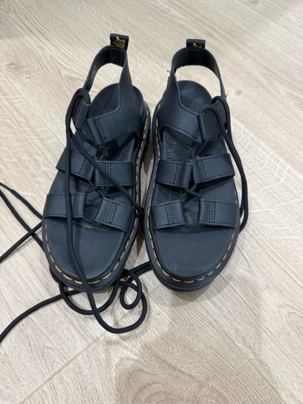 Dr. Martens Black Leather Sandals with Yellow Stitching
